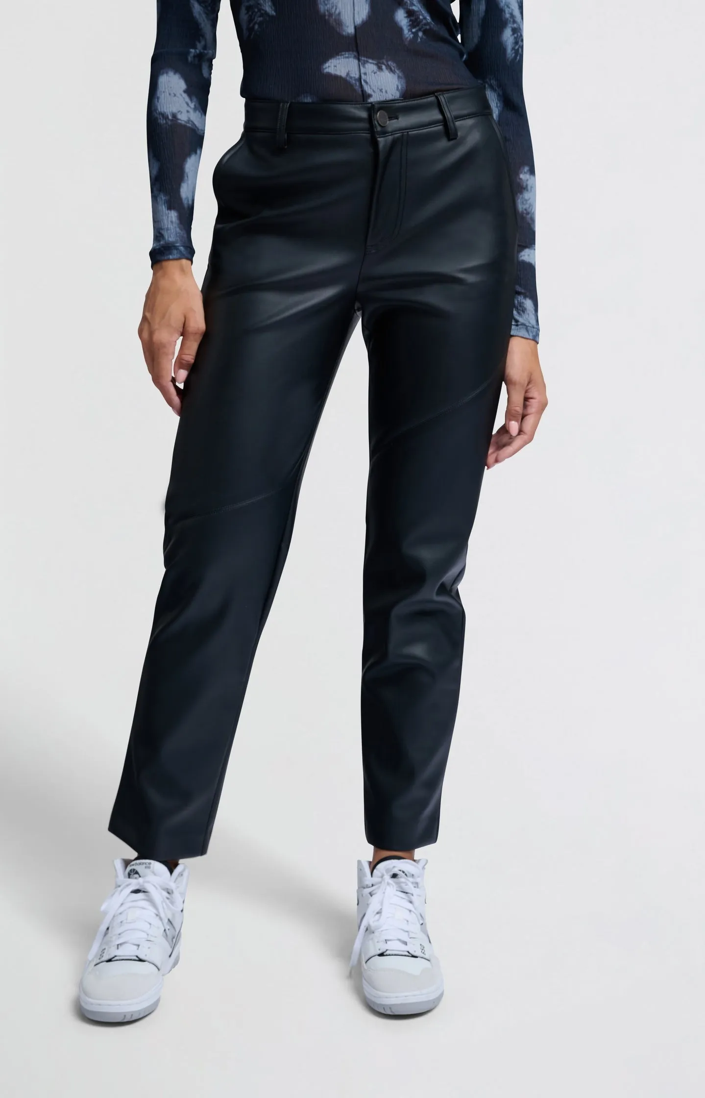 Black faux leather pants with high waist and straight legs